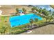 Outdoor basketball court with palm trees and benches at 5629 Maidenstone Way, Palmetto, FL 34221