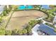 Community dog park with fenced area and shaded seating at 5629 Maidenstone Way, Palmetto, FL 34221