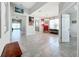 Open living area with tile flooring and access to other rooms at 5629 Maidenstone Way, Palmetto, FL 34221
