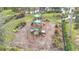 Community playground with playset and wood chips at 5629 Maidenstone Way, Palmetto, FL 34221