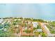 Aerial view showing home's location near the water at 604 Pennsylvania Ave, Crystal Beach, FL 34681