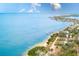Aerial view showcasing waterfront property with homes and boat docks at 604 Pennsylvania Ave, Crystal Beach, FL 34681