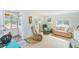 Cozy living room with comfortable seating and beachy decor at 604 Pennsylvania Ave, Crystal Beach, FL 34681