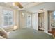 Relaxing bedroom with natural light, hardwood floors, closet, and contemporary decor at 612 12Th S Ave, St Petersburg, FL 33701