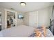 Cozy bedroom featuring a comfortable bed, tv, and easy access to other areas at 612 12Th S Ave, St Petersburg, FL 33701