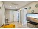 Hallway with tile flooring and multiple doorways leading to different rooms in the house at 612 12Th S Ave, St Petersburg, FL 33701