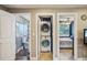 Hallway featuring laundry closet, bathroom and bedroom at 612 12Th S Ave, St Petersburg, FL 33701