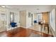 Inviting living space with hardwood floors, a barn door, stylish furnishings, and access to a modern bathroom at 612 12Th S Ave, St Petersburg, FL 33701