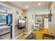 Open floor plan with tile flooring, a comfortable living area, and doorways to the bedroom and kitchen at 612 12Th S Ave, St Petersburg, FL 33701