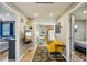 Inviting living space with tile flooring, a colorful rug, and an entertainment center at 612 12Th S Ave, St Petersburg, FL 33701