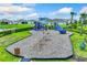 playground with swings and climbing structures at 6123 Distant Haze Pl, Palmetto, FL 34221