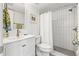 Clean bathroom with shower, toilet and white vanity at 6265 Sun Blvd # 101, St Petersburg, FL 33715