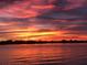 Stunning sunset over calm waters at 6265 Sun Blvd # 101, St Petersburg, FL 33715