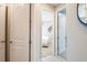 Bright hallway with doors leading to bedrooms at 710 Sky Shade Dr, Apollo Beach, FL 33572