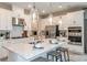 Modern kitchen with stainless steel appliances and white cabinets at 710 Sky Shade Dr, Apollo Beach, FL 33572