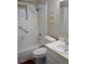 Bathroom with shower/tub, sink, and linen storage at 711 E Brockton Pl, Sun City Center, FL 33573