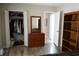 Bedroom with double closet and dresser at 711 E Brockton Pl, Sun City Center, FL 33573