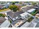 Home's backyard and surrounding neighborhood, from above at 9445 Barnstead Ln, Port Richey, FL 34668