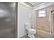 Clean bathroom with a tub shower combo at 9445 Barnstead Ln, Port Richey, FL 34668