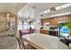 Kitchen features wood cabinets, breakfast bar and island at 9445 Barnstead Ln, Port Richey, FL 34668