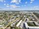 An aerial view of a vibrant coastal community, showcasing residential and commercial areas at 9945 47Th N Ave # 206, St Petersburg, FL 33708