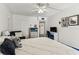 Bedroom with desk, white dresser and ceiling fan at 9945 47Th N Ave # 206, St Petersburg, FL 33708