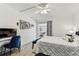Bedroom with a desk, chair, and a view of the patio at 9945 47Th N Ave # 206, St Petersburg, FL 33708