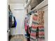 Walk-in closet featuring clothing on hangers and shoe racks at 9945 47Th N Ave # 206, St Petersburg, FL 33708
