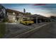 Apartment building with parking and a yellow car at 9945 47Th N Ave # 206, St Petersburg, FL 33708