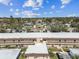 Aerial view of condos showing the roof and the surrounding residential neighborhood at 9945 47Th N Ave # 206, St Petersburg, FL 33708
