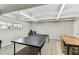 Bright game room with ping pong and card tables, ideal for social gatherings at 9945 47Th N Ave # 206, St Petersburg, FL 33708