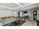 Game room with ping pong and card tables, plus a sink area for added convenience at 9945 47Th N Ave # 206, St Petersburg, FL 33708