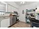 Efficient kitchen features modern appliances, ample cabinet space, and a convenient breakfast bar at 9945 47Th N Ave # 206, St Petersburg, FL 33708