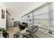 Cozy sunroom featuring comfortable seating, stylish decor, and lots of natural light at 9945 47Th N Ave # 206, St Petersburg, FL 33708
