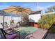 Outdoor entertainment area with a projector screen and comfortable seating at 10941 Oakdale Ave, Port Richey, FL 34668