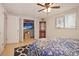 Bedroom with a built-in TV and additional closet space at 10941 Oakdale Ave, Port Richey, FL 34668