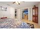 Bedroom with a built-in TV and additional closet space at 10941 Oakdale Ave, Port Richey, FL 34668