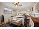 Cozy bedroom with a white bed frame and geometric rug at 10941 Oakdale Ave, Port Richey, FL 34668