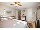 Bright bedroom with ample closet space and a full-size bed at 10941 Oakdale Ave, Port Richey, FL 34668