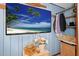 Large closet with ample hanging space and shelving at 10941 Oakdale Ave, Port Richey, FL 34668