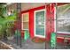 Inviting front entrance with a green door and decorative accents at 10941 Oakdale Ave, Port Richey, FL 34668