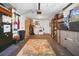 Spacious garage with washer, dryer, and ample storage shelving at 10941 Oakdale Ave, Port Richey, FL 34668