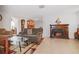 Living room features fireplace and ample seating at 10941 Oakdale Ave, Port Richey, FL 34668