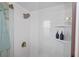 Bright shower with subway tile and glass enclosure at 10941 Oakdale Ave, Port Richey, FL 34668