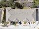 Top-down view of townhouses, showcasing the building's roofline and parking area at 1115 Andrew Aviles Cir, Tampa, FL 33619