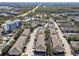 Aerial view showing townhome community and surrounding area at 1115 Andrew Aviles Cir, Tampa, FL 33619
