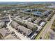 Aerial view of townhouses near a lake at 1115 Andrew Aviles Cir, Tampa, FL 33619