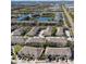 Aerial view of townhouses and surrounding landscape at 1115 Andrew Aviles Cir, Tampa, FL 33619