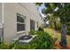 Private backyard with a patio and lush landscaping at 1115 Andrew Aviles Cir, Tampa, FL 33619
