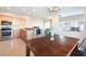Kitchen dining area with wood table and chandelier at 1115 Andrew Aviles Cir, Tampa, FL 33619